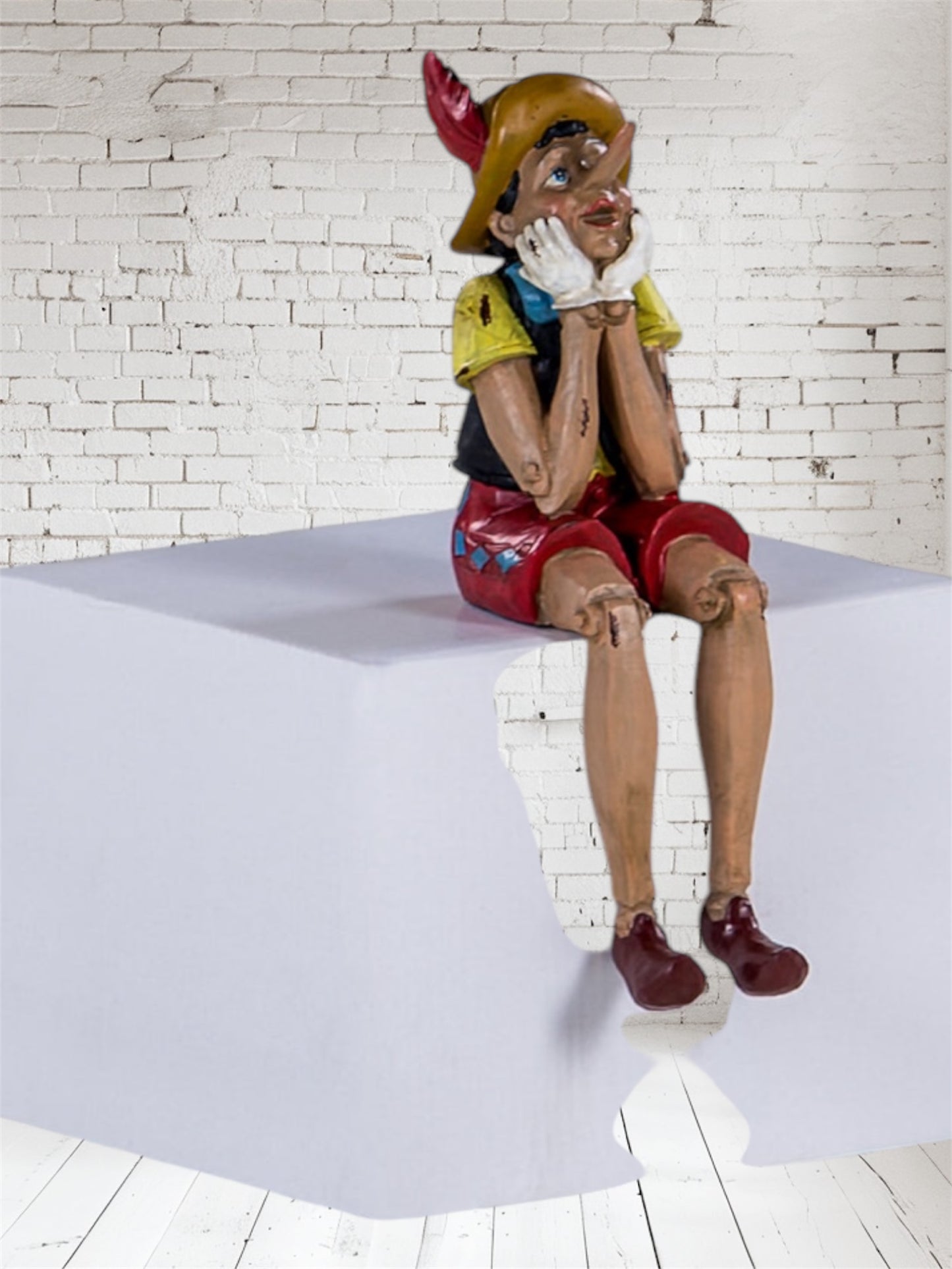 Sitting Shelf Pinocchio - Adorable Antique-Style Resin Figurine | Sign of the times Stoke