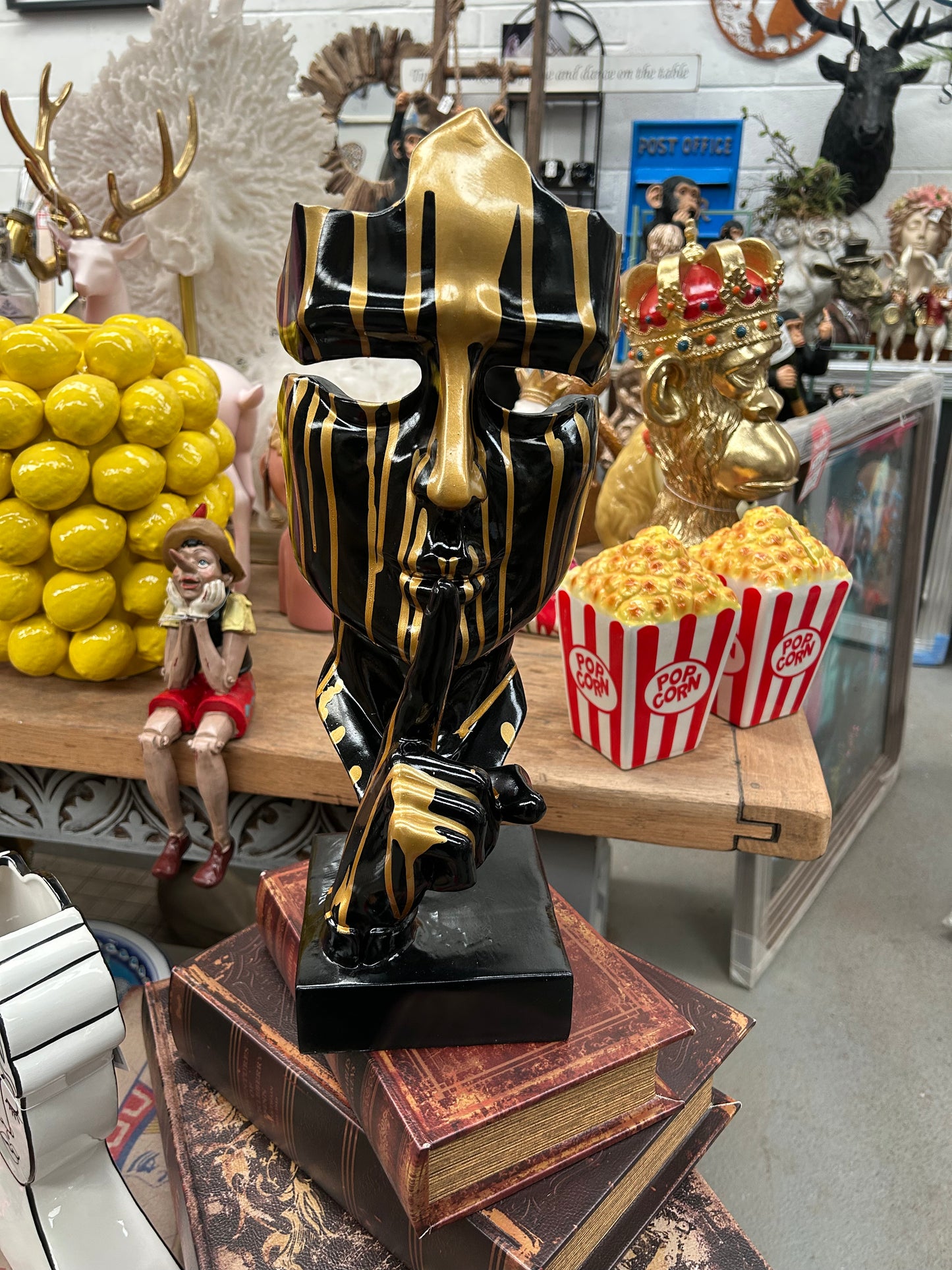 Stunning Black and Gold Splashed Painted Face Sculpture – Contemporary Artistic Decor