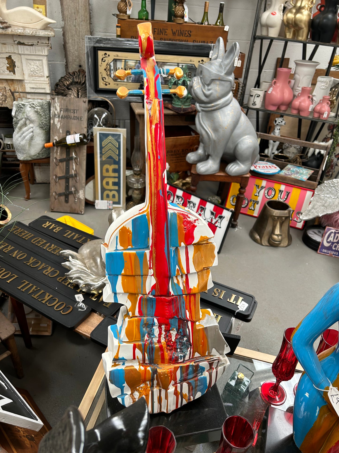 Splash Painted Violin Sculpture – Rotating Resin Art on Black Marble Base | Sign of the times Stoke