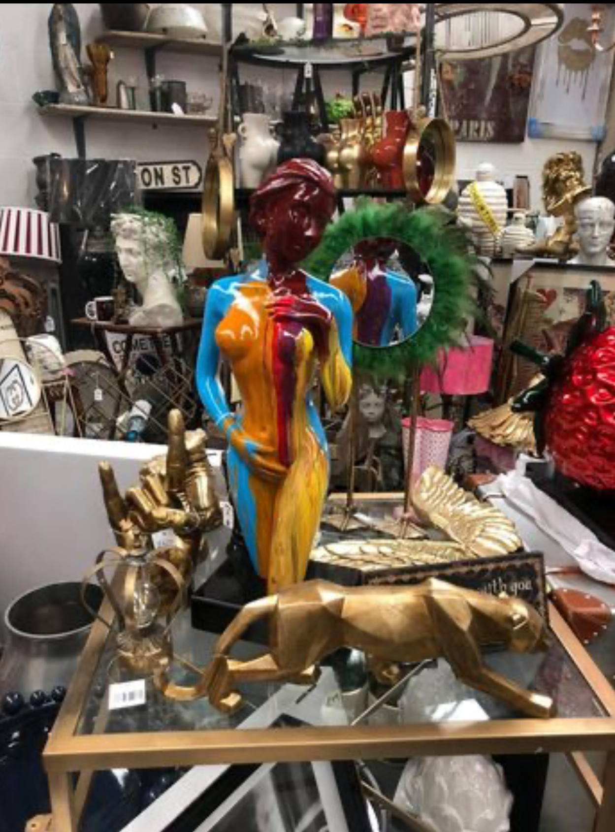 Paint-Splashed Lady Sculpture - Resin Art on Rotating Black Plinth | Sign of the times Stoke