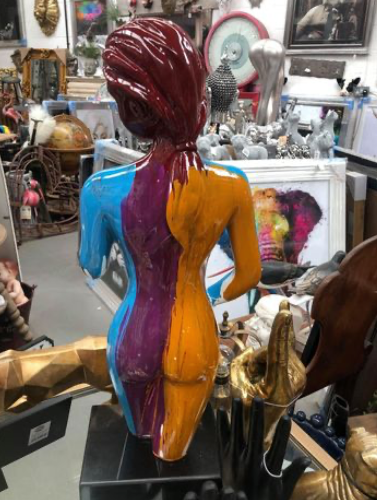 Paint-Splashed Lady Sculpture - Resin Art on Rotating Black Plinth | Sign of the times Stoke