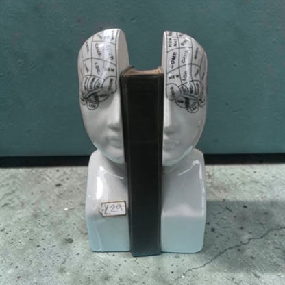 Antiqued  ceramic phrenology head bookends/ornaments